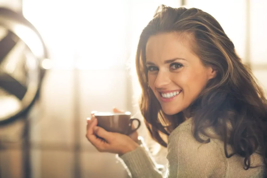 Woman having her early morning coffee