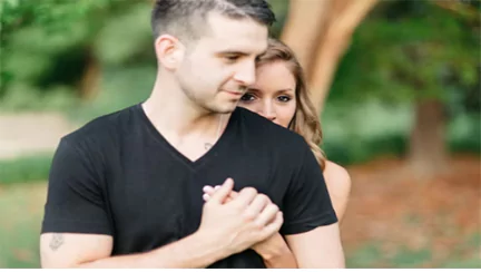 young couple taking a walk in the park