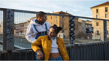 two people outside enjoying the fresh air