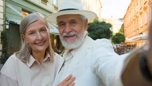 senior dating couple taking a selfie
