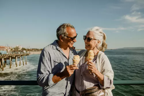 senior couple eating ice cream cones